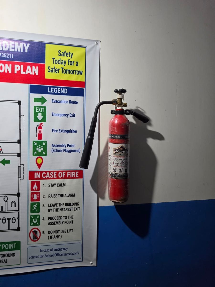 Carbon dioxide fire extinguisher and evacuation plan at Falakata Usha Academy